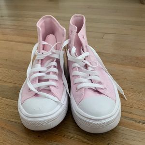 Pink high top converse sneakers